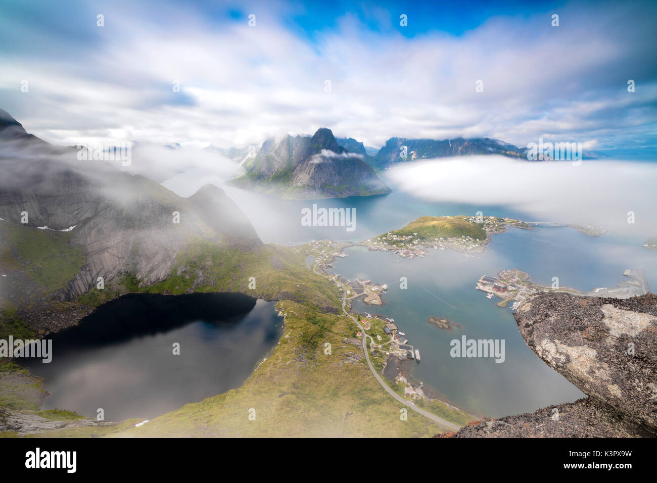 Top view of lakes and sea under the cloudy sky at summer Reinebringen Moskenes Lofoten Islands Norway Europe Stock Photo