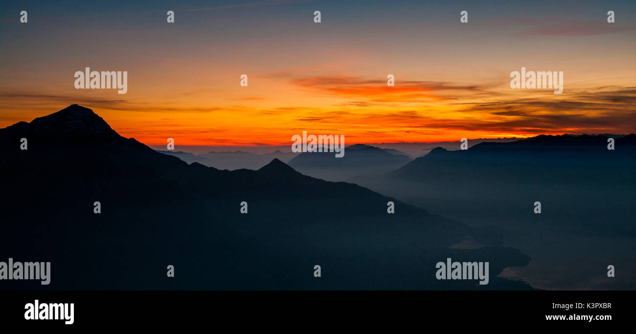 Autumn sunset from Monte Brusada, Valtellina, Lombardy, Italy Stock Photo