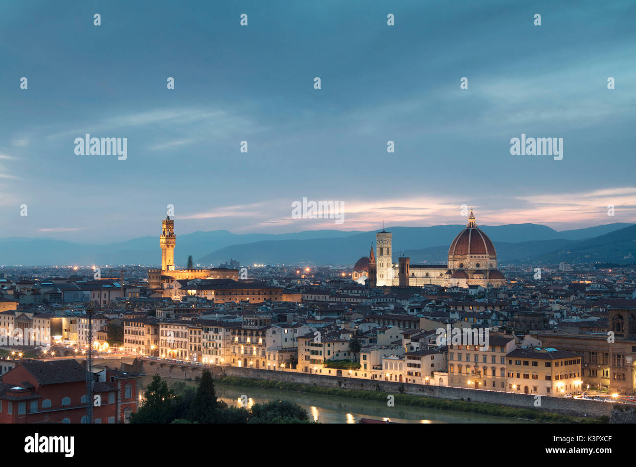 The blue light of dusk frames the city of Florence crossed by Arno River seen from Piazzale Michelangelo Tuscany Italy Europe Stock Photo