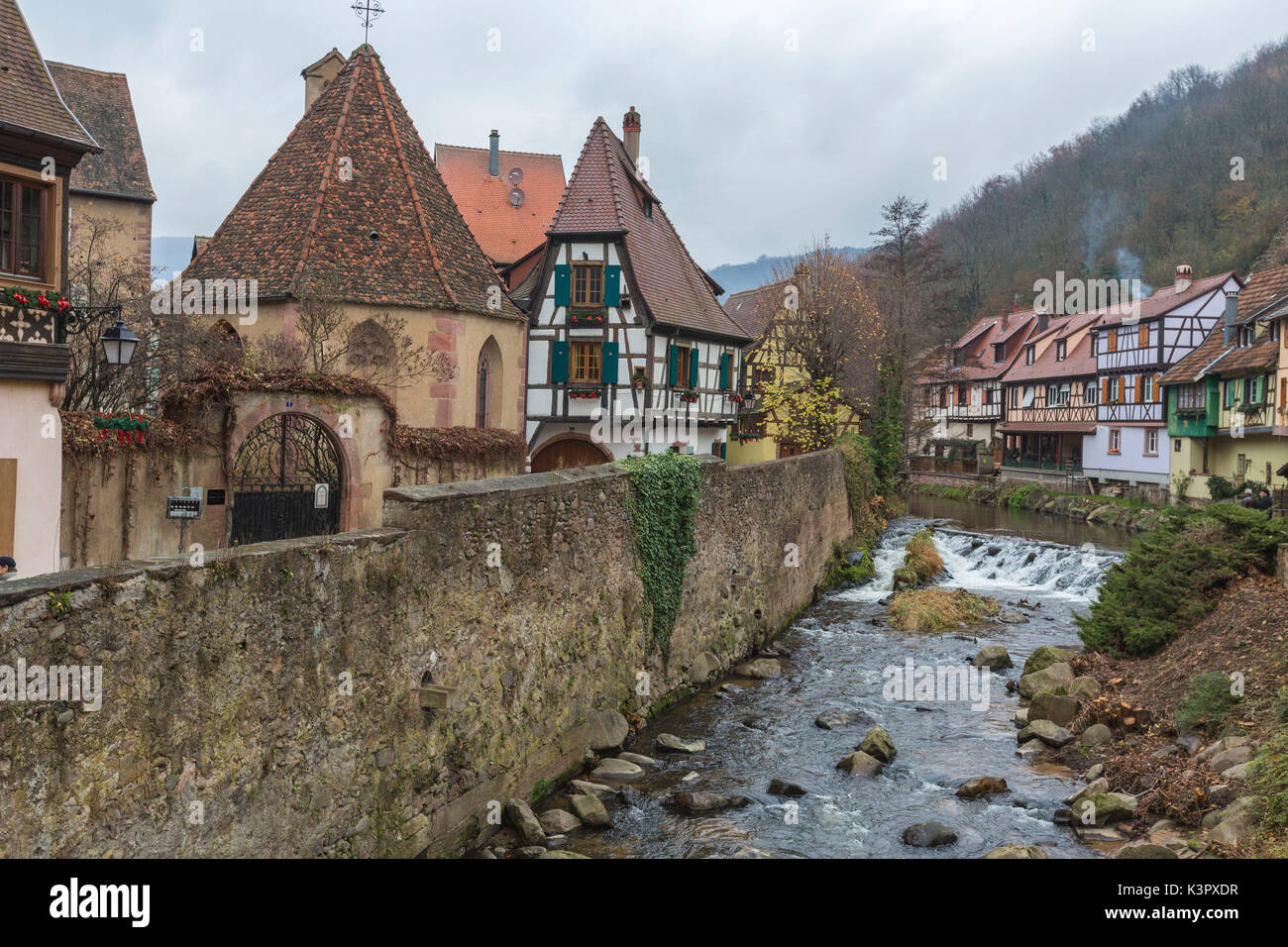 Typical architecture of the old medieval town and bridge on river Weiss Kaysersberg Haut-Rhin department Alsace France Europe Stock Photo