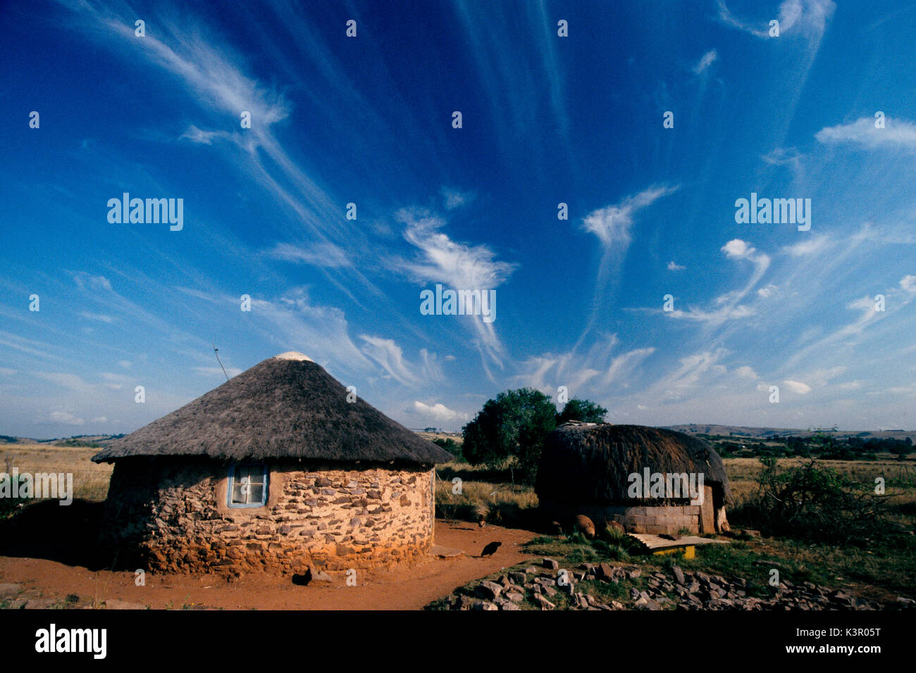 Scattered huts in a village in the Zululand, South Africa Stock Photo