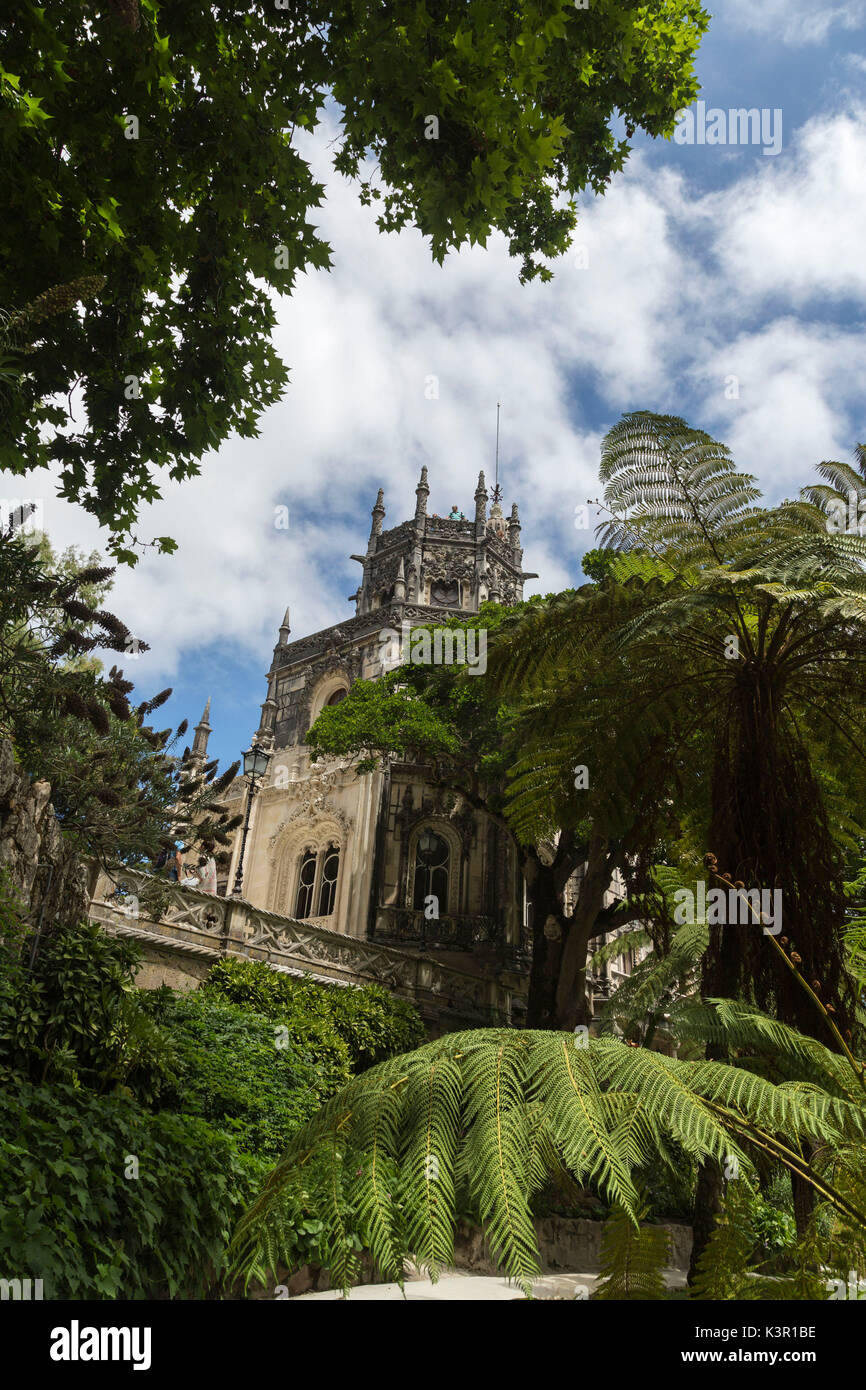 Old mystical buildings of Romanesque Gothic and Renaissance style inside the park Quinta da Regaleira Sintra Portugal Europe Stock Photo