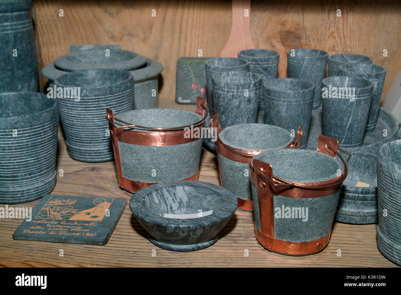 Pots made of Pietra Ollare with copper strapping with lid produced in  Prosto di Piuro in Valchiavenna and used to cook and preserve food,  Valtellina, Lombardy Italy Europe Stock Photo - Alamy
