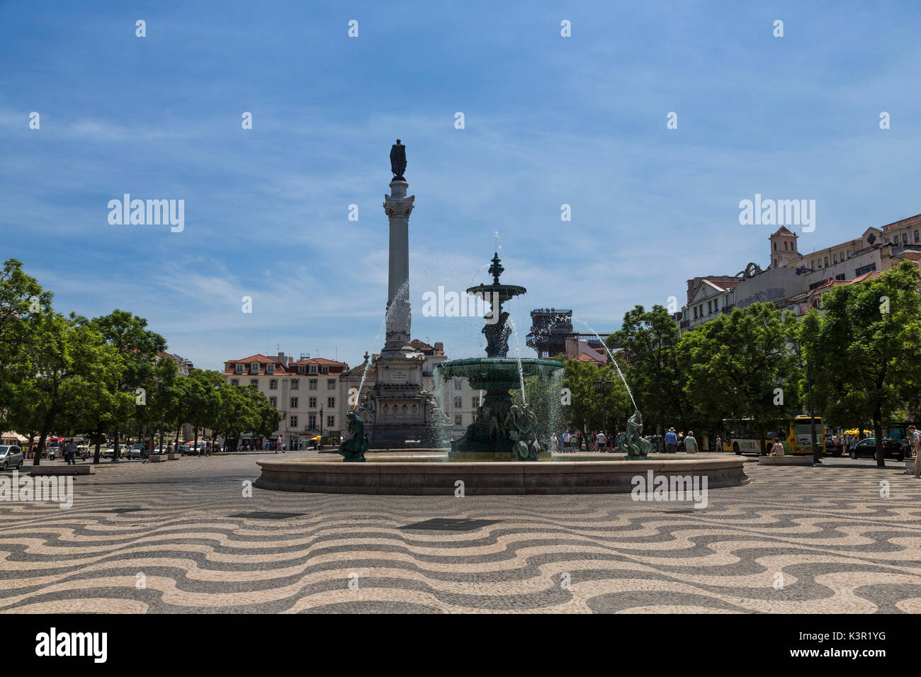 Fountain frames the old palace in Praça Dom Pedro IV also known as Rossio Square Pombaline Downtown of Lisbon Portugal Europe Stock Photo