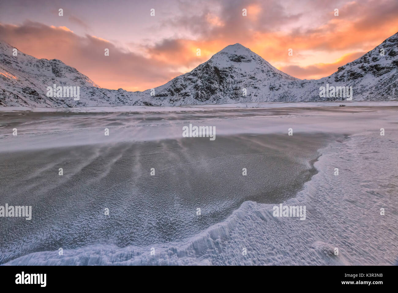 Wind blows on the cold sea of Uttakleiv at dawn.  Lofoten Islands Norway Europe Stock Photo