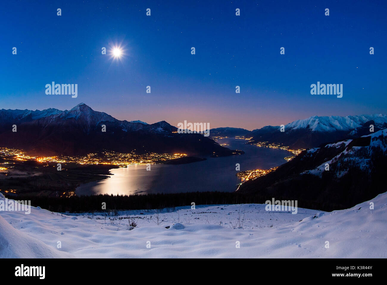 The moon lights up the night over Alto Lario. Lombardy, Italy. Stock Photo