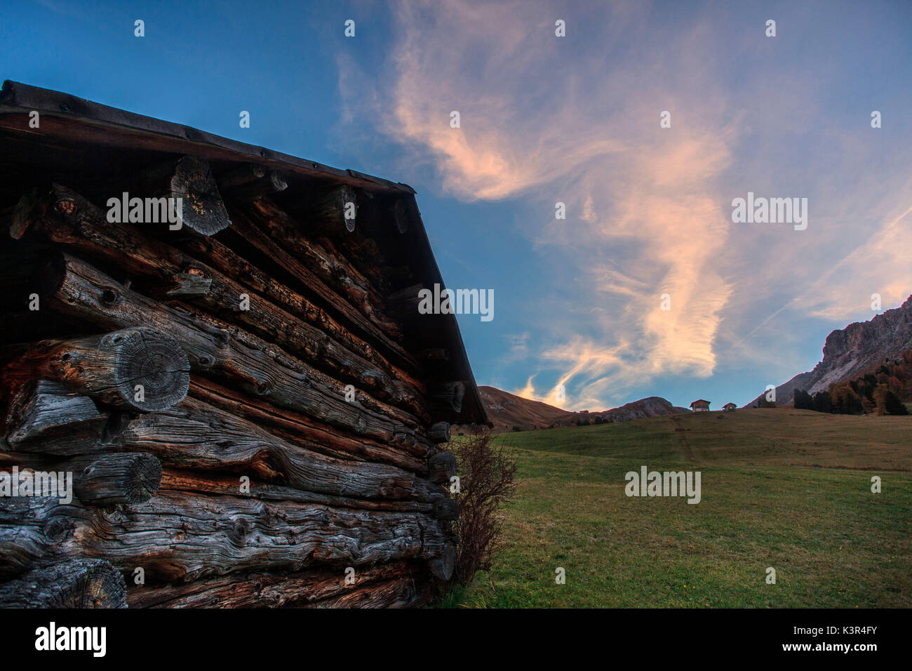Sunrise at malga Gampen, in the background the Odle group, Trentino Alto Adige, Italy Stock Photo