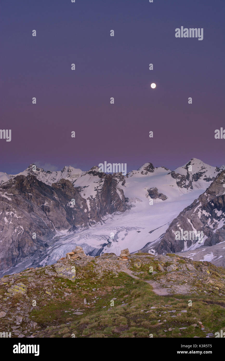 Stelvio glacier at sunset with the Moon, the Stelvio National Park