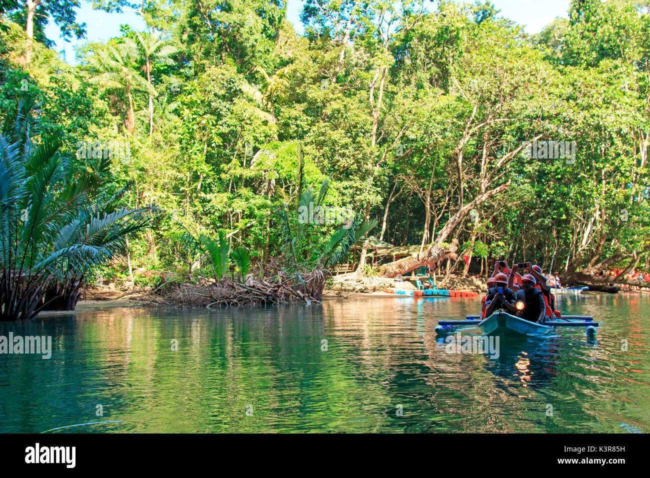 Puerto Princesa, Philippines. Visitors enter the Subterranean River in Puerto Princessa.The Underground River is one of the New 7 Wonders of Nature. Stock Photo