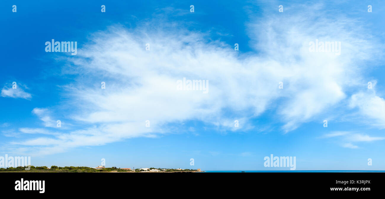 Blue sky background with white clouds and sea coast Stock Photo - Alamy