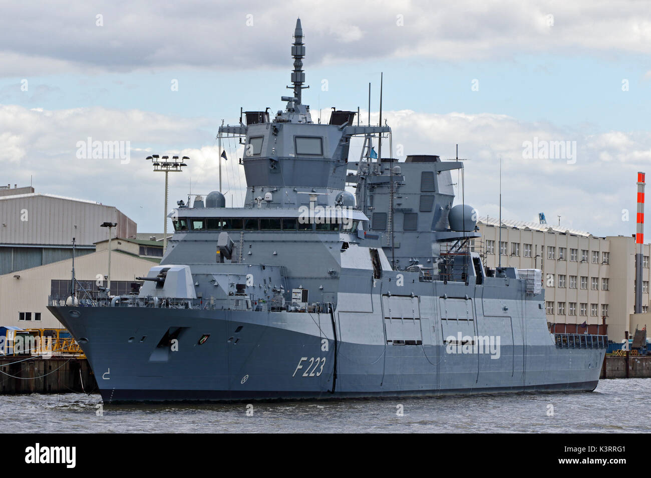 The warship Nordrhein-Westfalen F223 is located in the port of Hamburg. Stock Photo