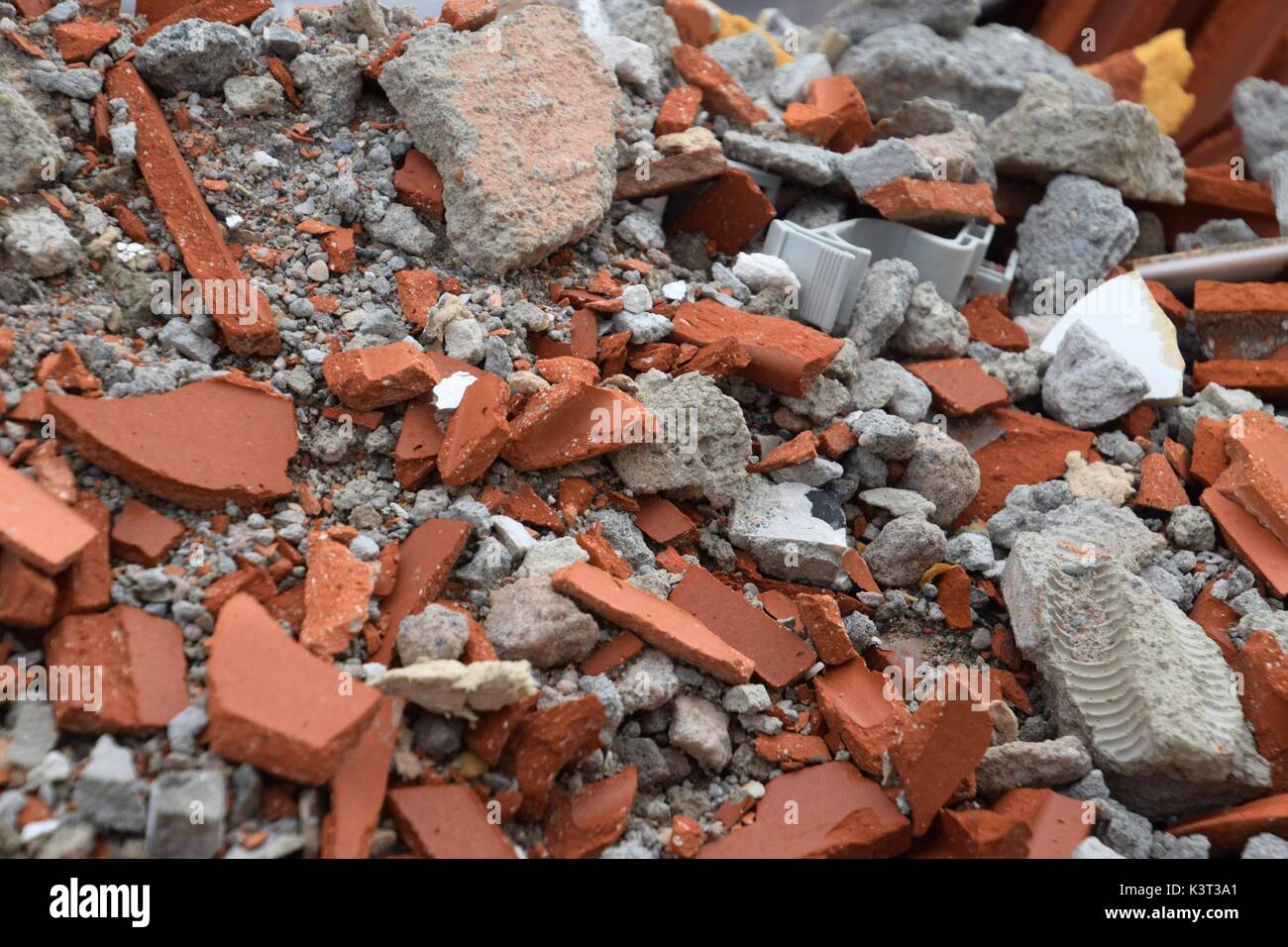 constructions waste consists of unwanted material produced dirctly or incidentally by the construction of industries, includes building materials Stock Photo