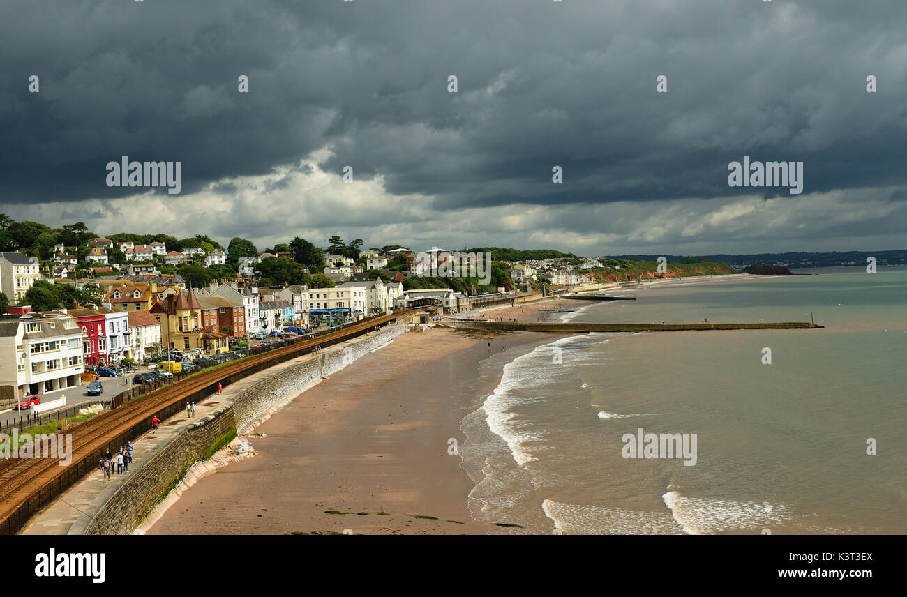 Sunshine and dark clouds over Dawlish seafront, looking towards Exmouth. Stock Photo