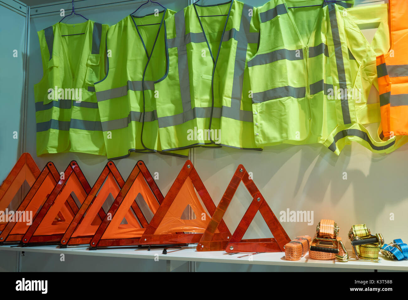 Emergency reflective triangle signs, yellow reflective vests for drivers and tow ropes Stock Photo