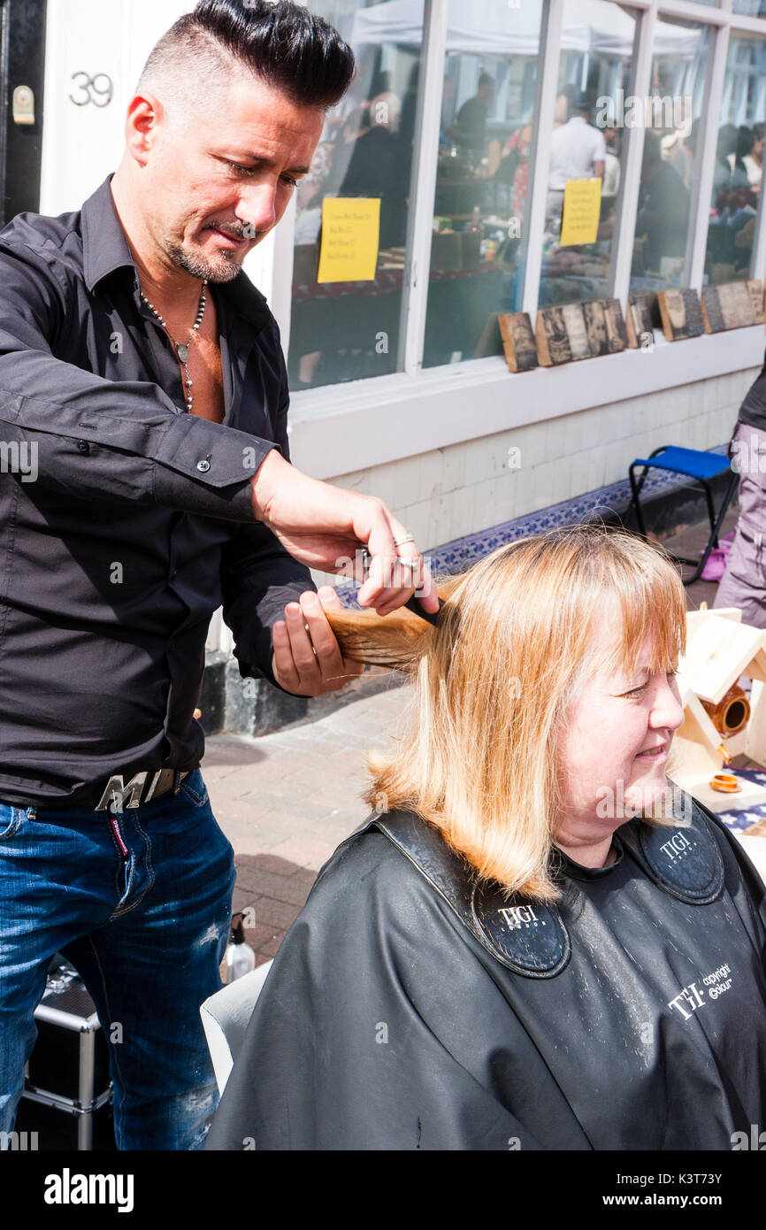 Local Celebrity Hairdresser Marcello Cuts Hair For A Charity Stock