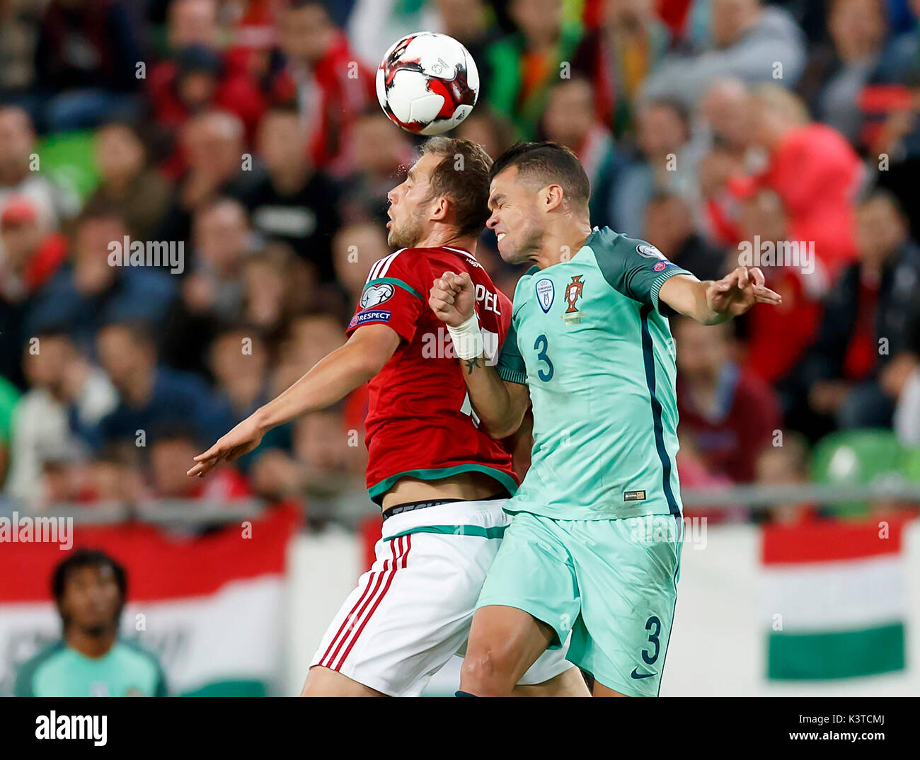 Budapest, Hungary. 03rd Sep, 2017. BUDAPEST, HUNGARY - SEPTEMBER 3: Marton Eppel (L) of Hungary fights for the ball in the air with Pepe #3 of Portugal during the FIFA 2018 World Cup Qualifier match between Hungary and Portugal at Groupama Arena on September 3, 2017 in Budapest, Hungary. Credit: Laszlo Szirtesi/Alamy Live News Stock Photo