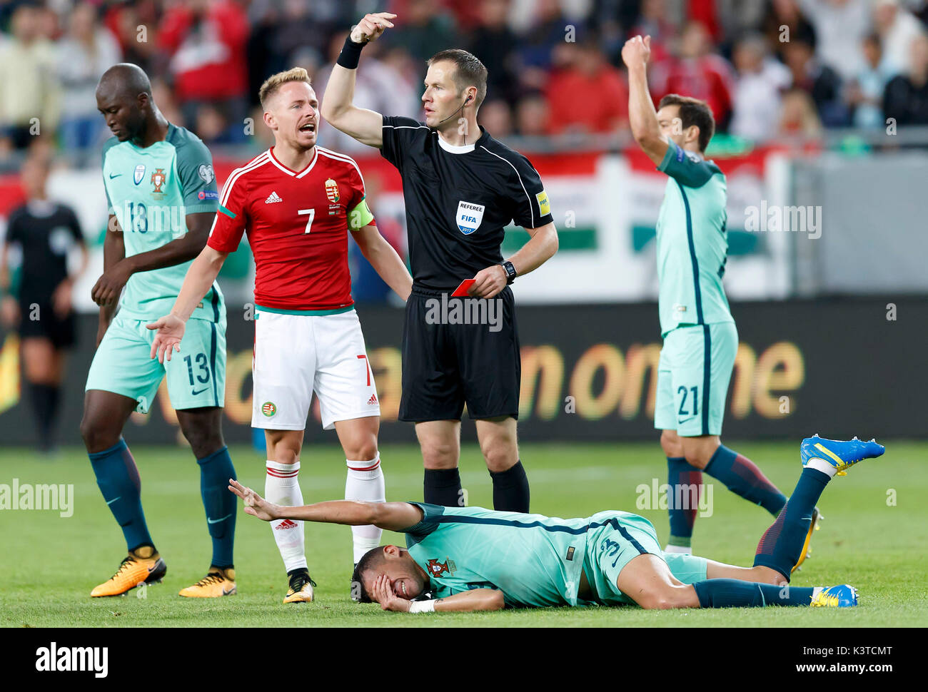 Budapest, Hungary. 03rd Sep, 2017. BUDAPEST, HUNGARY - SEPTEMBER 3: Balazs Dzsudzsak #7 of Hungary argues with referee Danny Makkelie about the sendoff of Tamas Priskin (image not shown) behind Pepe #3 of Portugal during the FIFA 2018 World Cup Qualifier match between Hungary and Portugal at Groupama Arena on September 3, 2017 in Budapest, Hungary. Credit: Laszlo Szirtesi/Alamy Live News Stock Photo