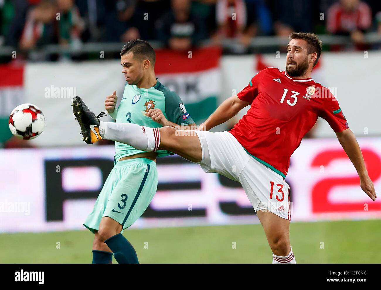 Budapest, Hungary. 03rd Sep, 2017. BUDAPEST, HUNGARY - SEPTEMBER 3: Daniel Bode #13 of Hungary fights for the ball with Pepe #3 of Portugal during the FIFA 2018 World Cup Qualifier match between Hungary and Portugal at Groupama Arena on September 3, 2017 in Budapest, Hungary. Credit: Laszlo Szirtesi/Alamy Live News Stock Photo