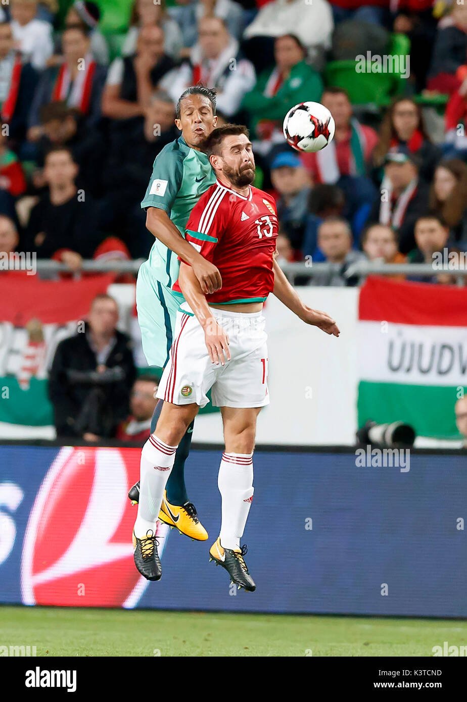Budapest, Hungary. 03rd Sep, 2017. BUDAPEST, HUNGARY - SEPTEMBER 3: Daniel Bode #13 of Hungary battles for the ball in the air with Bruno Alves (L) of Portugal during the FIFA 2018 World Cup Qualifier match between Hungary and Portugal at Groupama Arena on September 3, 2017 in Budapest, Hungary. Credit: Laszlo Szirtesi/Alamy Live News Stock Photo