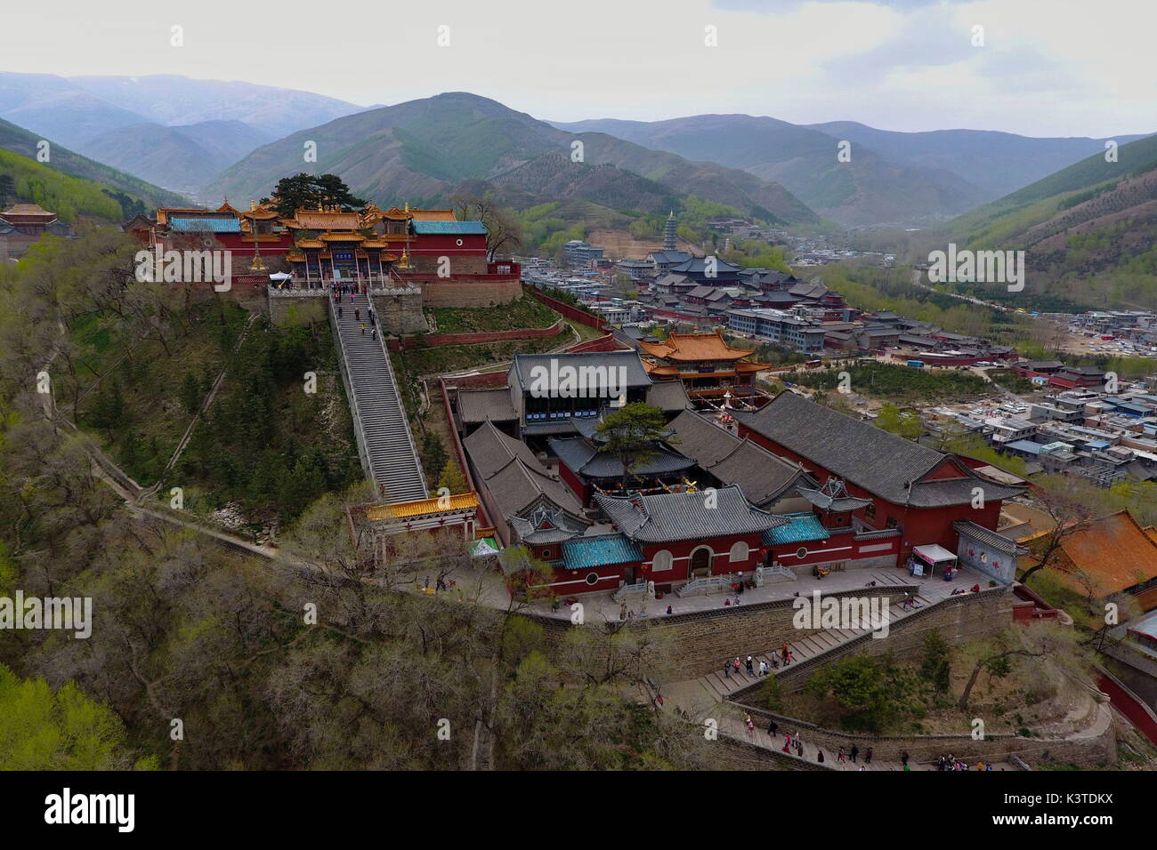 Mount Wutai. 9th May, 2017. Photo taken on May 9, 2017 shows an aerial view of temples on Mount Wutai, one of four sacred Buddhist mountains in China, in north China's Shanxi Province. Added to UNESCO's World Heritage List in 2009, Mount Wutai is home to over 50 Buddhist temples. Credit: Cao Yang/Xinhua/Alamy Live News Stock Photo