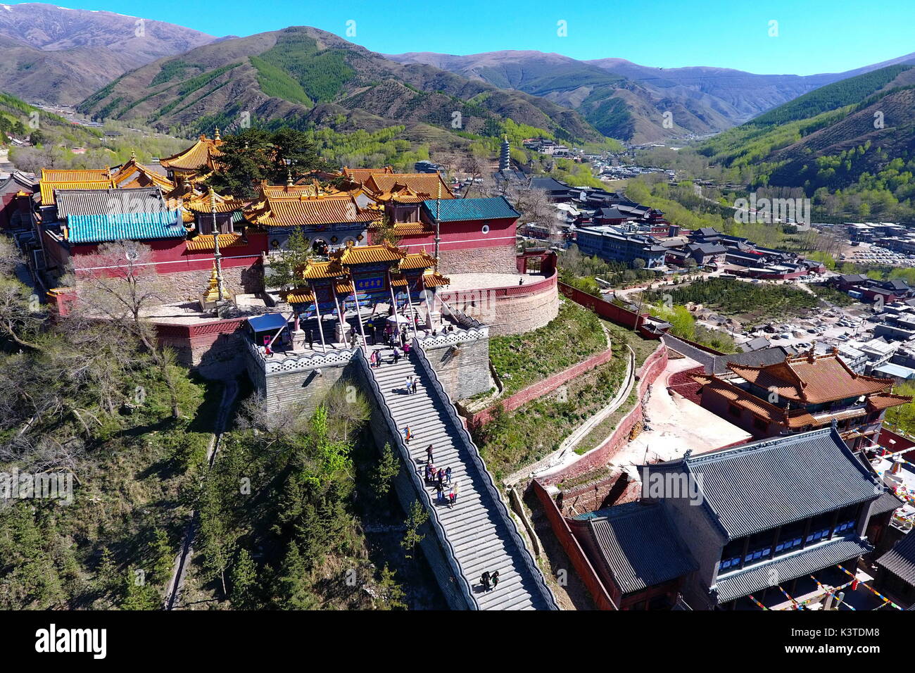 Mount Wutai. 9th May, 2017. Photo taken on May 9, 2017 shows an aerial view of Pusading Temple on Mount Wutai, one of four sacred Buddhist mountains in China, in north China's Shanxi Province. Added to UNESCO's World Heritage List in 2009, Mount Wutai is home to over 50 Buddhist temples. Credit: Cao Yang/Xinhua/Alamy Live News Stock Photo