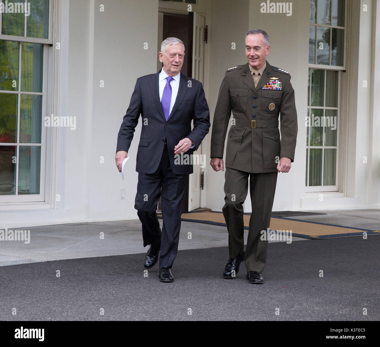 United States Secretary of Defense James Mattis (left) and the Chairman of the Joint Chiefs of Staff US Marine Corps General Joseph Dunford (right) walk to the microphones at The White House to make a statement on a possible military response to the recent North Korea missile launch, September 3, 2017. Credit: Chris Kleponis/Pool via CNP /MediaPunch Stock Photo