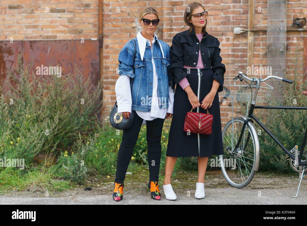 Blogger Janka Polliani and editor Darja Barannik posing outside the Ganni runway show during Copenhagen Fashion Week - Aug 10, 2017 - Photo: Runway Manhattan/Grace Lunn ***For Editorial Use Only*** | usage worldwide Stock Photo