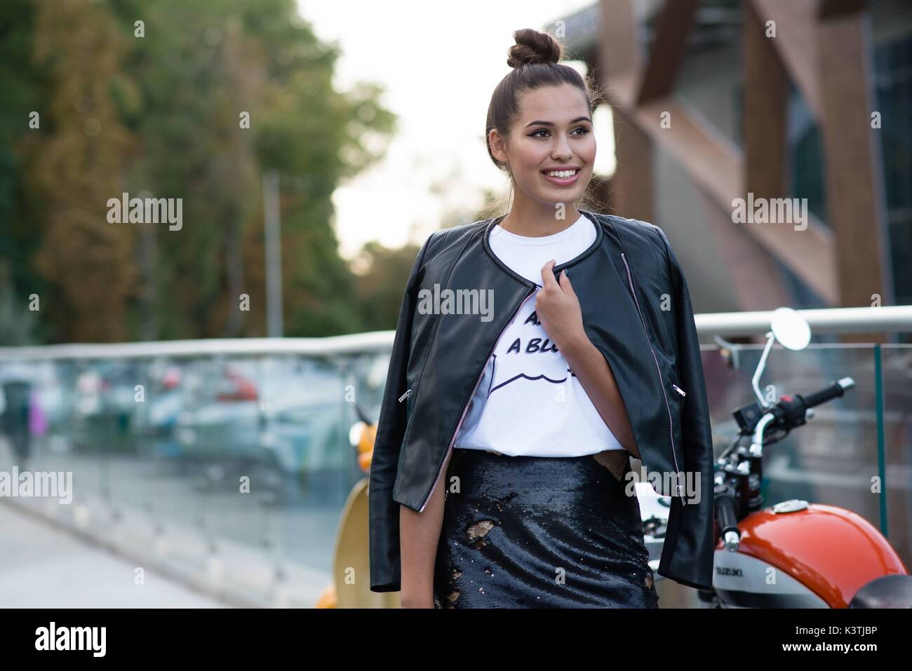 Blogger Sasha Zayats walking outside Mercedes Benz Kiev Fashion