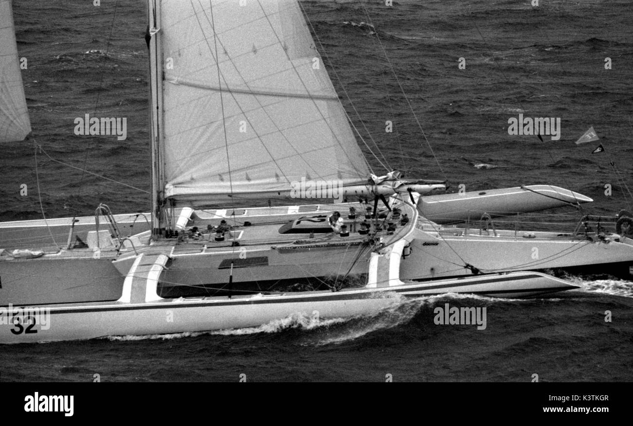 AJAXNETPHOTO, NOVEMBER, 1982. ST.MALO, FRANCE. - ROUTE DU RHUM RACE - THE FRENCH TRIMARAN WILLIAM SAURIN HEADS DOWN CHANNEL AFTER THE START. PHOTO: JONATHAN EASTLAND/AJAX REF:821007 37 Stock Photo