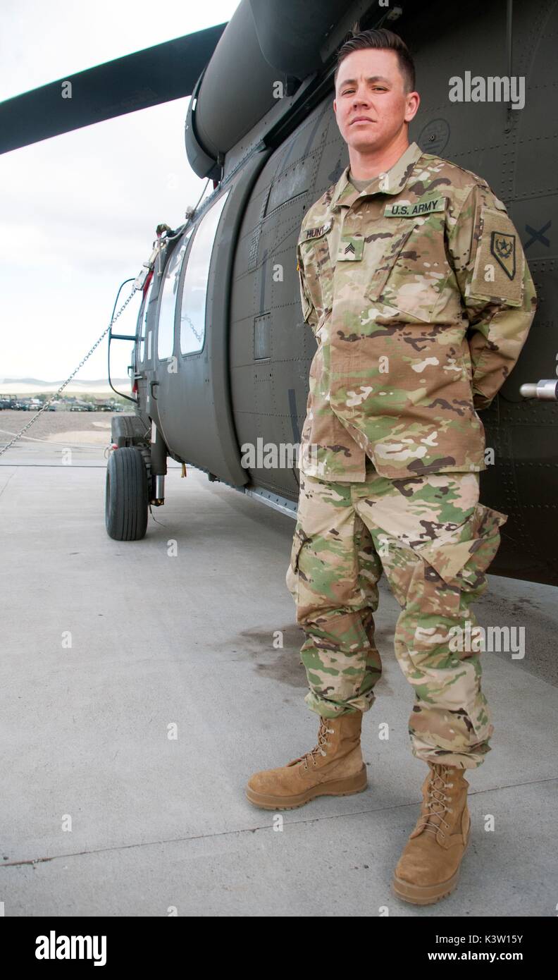 U.S. Army National Guard soldier Sam Hunt poses in front of an aircraft on the flight line at the Army Aviation Support Facility May 12, 2017 in Stead, Nevada. Hunt is the first openly transgender soldier of the Nevada National Guard.  (photo by Emerson Marcus via Planetpix) Stock Photo