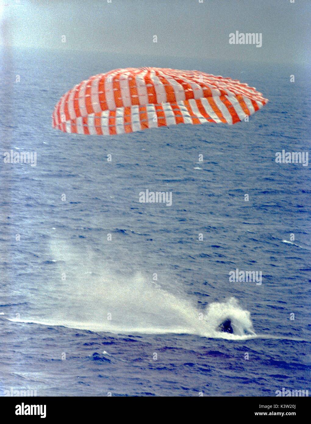 NASA Gemini 9 mission astronauts Gene Cernan and Thomas Stafford splash down in the ocean using retro-rocket parachutes during their reentry flight home June 6, 1966 in the Atlantic Ocean.  (photo by NASA Photo via Planetpix) Stock Photo