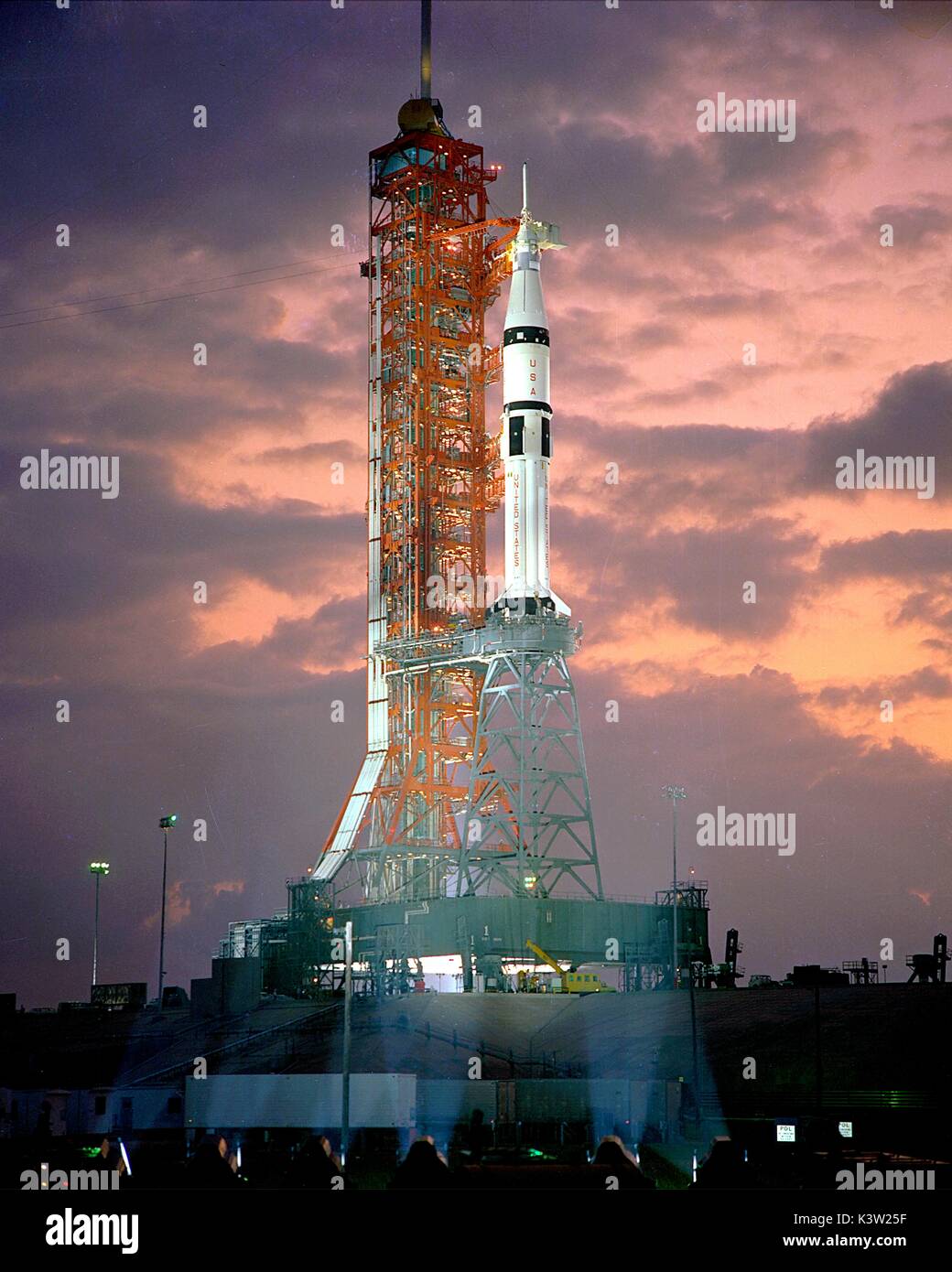 Dawn breaks behind the ASTP Saturn IB launch vehicle during the Countdown Demonstration Test for the Apollo Soyuz Test Project at the Kennedy Space Center July 2, 1975 in Cape Canaveral, Florida.  The mission will carry astronauts Thomas Stafford, Vance Brand and Donald Slayton to the dock with a Russian Soyuz spacecraft demonstrating that two different spacecraft can dock in space.  (photo by NASA/ Kennedy Space Center via Planetpix) Stock Photo