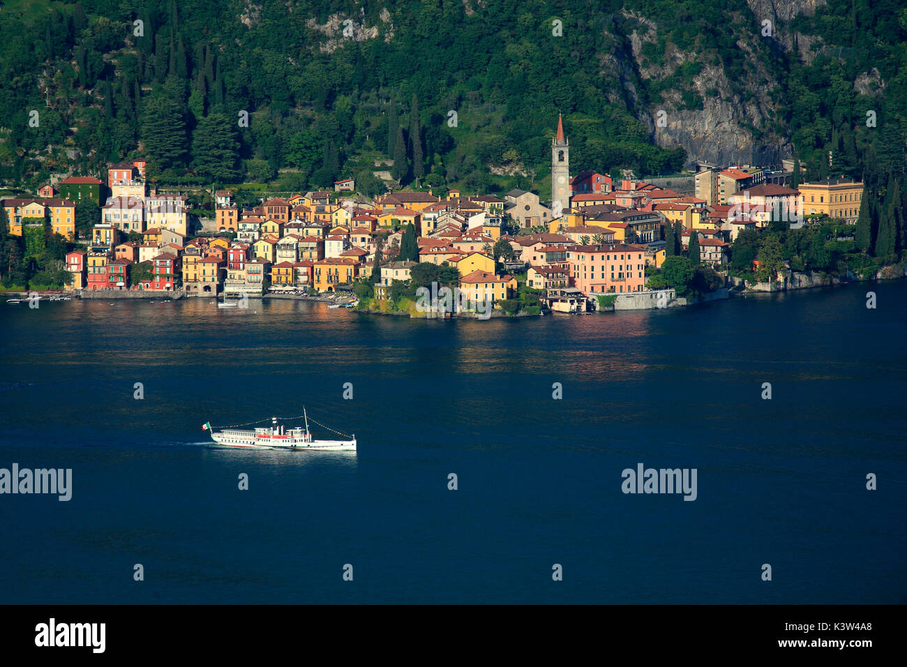 Concordia ferry crosses lake Como next to Varenna, Lake Como, Lecco province, Lombardy, Italy Stock Photo