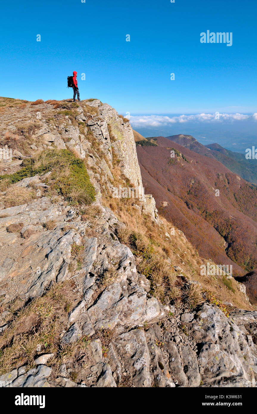 A trekker look at panorama in the Appennines. Corno alle Scale, Emilia Romagna Stock Photo