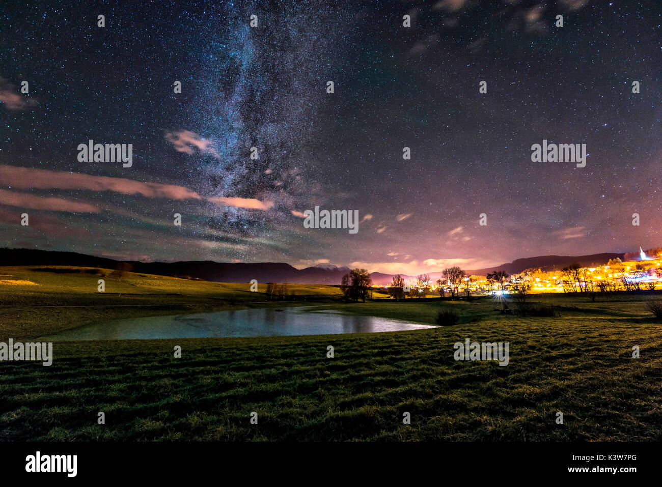 Italy, Trentino Alto Adige, starry night over lake of prairies of Non valley. Stock Photo