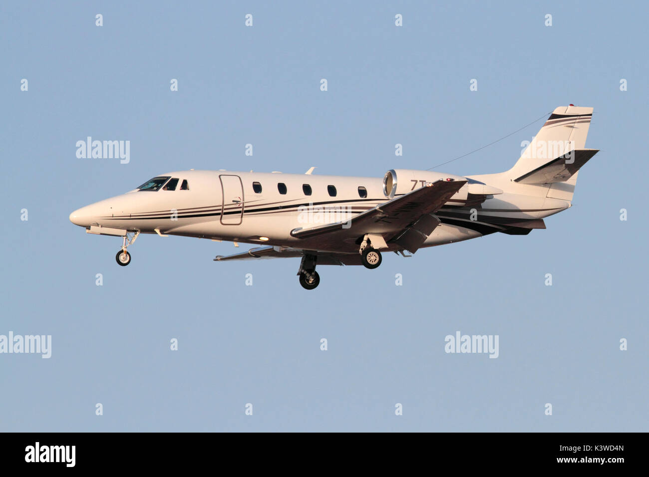 Cessna 560 Citation XLS+ private jet on approach at sunset Stock Photo