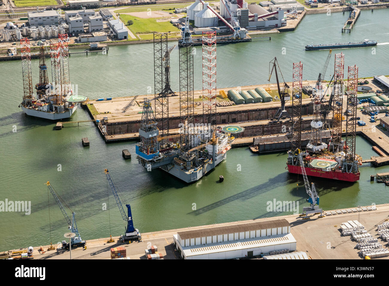 ROTTERDAM, THE NETHERLANDS - Rig platforms moored in the Port of Rotterdam. Stock Photo
