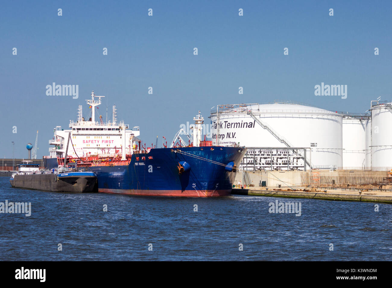 ANTWERP, BELGIUM - JUL 9, 2013: Oil tanker moored at the SEA-Tank Terminal Antwerp. Stock Photo