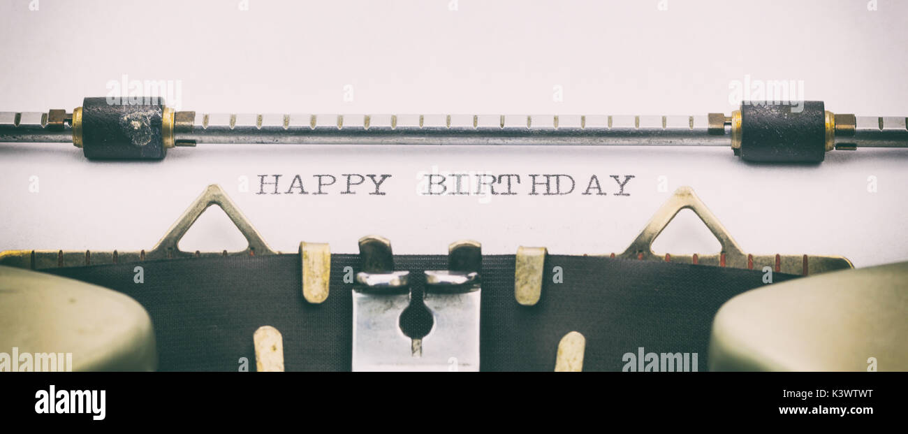 Close-up of HAPPY BIRTHDAY on a typewriter sheet Stock Photo