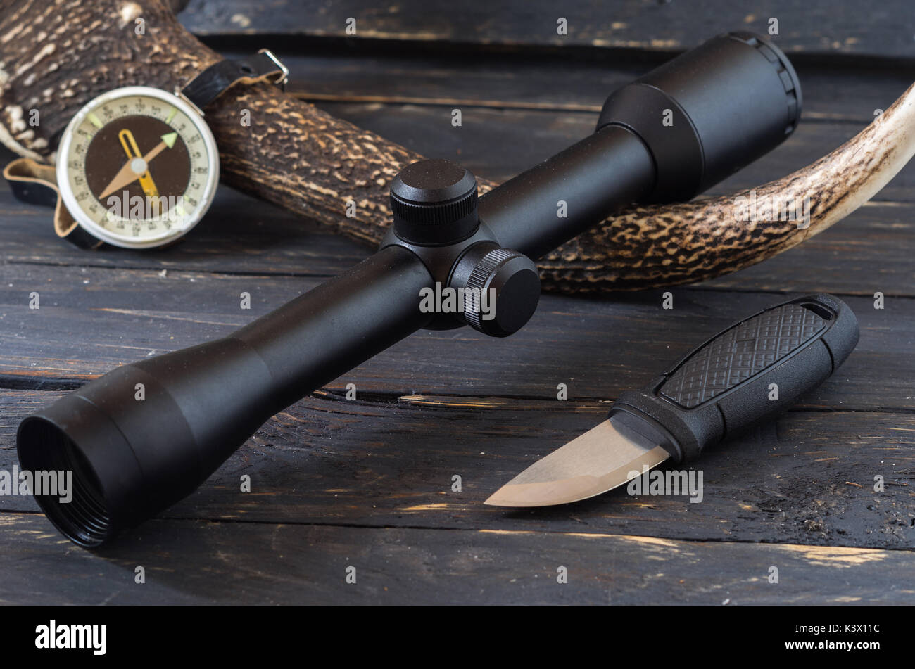 Hunting accessories for hunting game. Optical sight and compass Stock