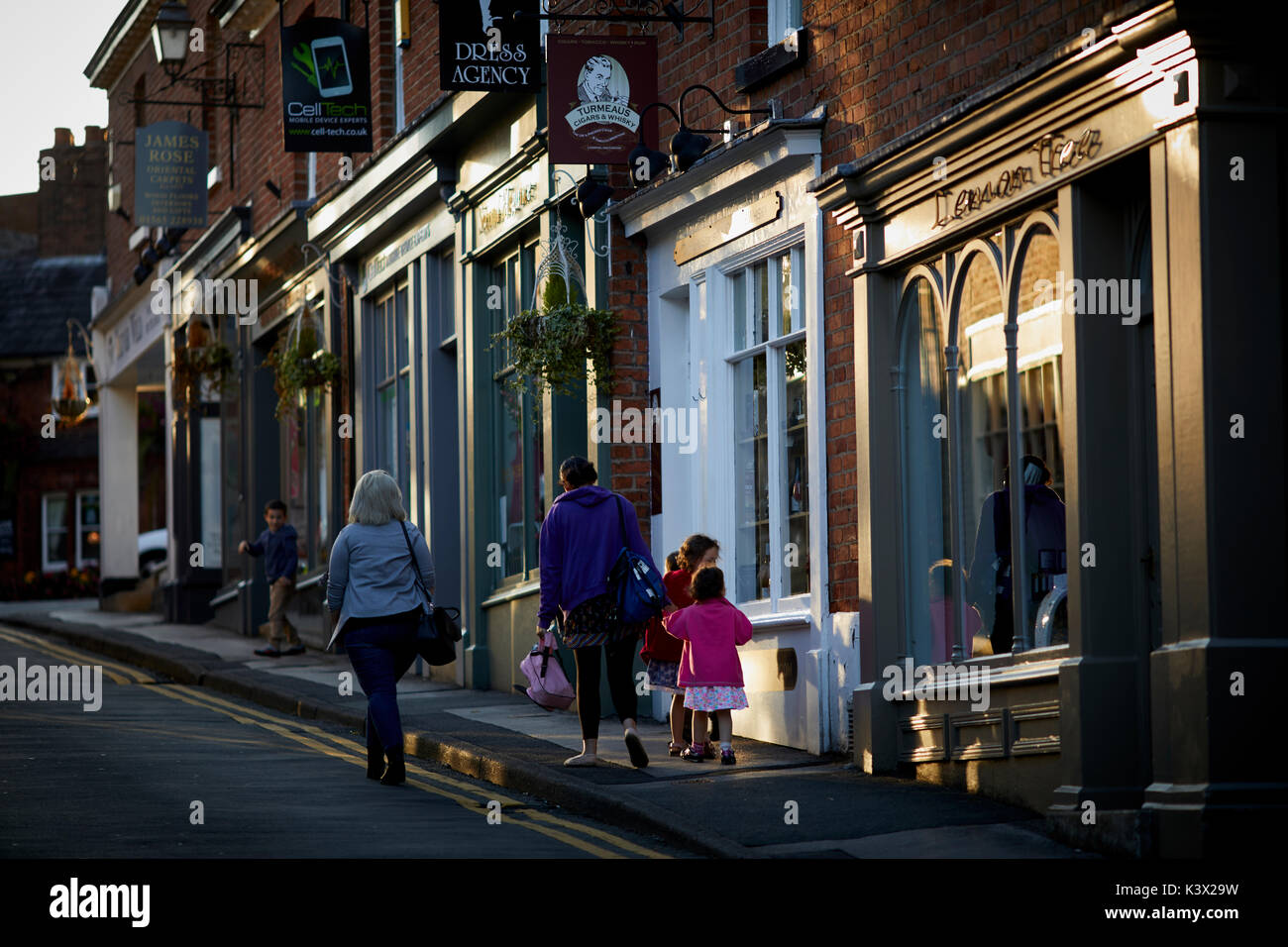 Local hight street in prosperous Knutsford in Cheshire, successful local independent retailers on Minshull Street Stock Photo