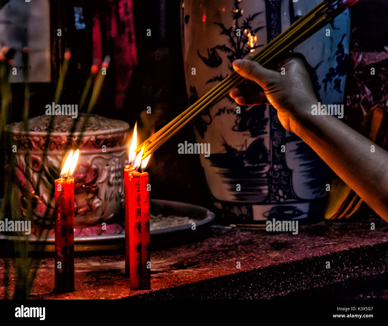 Buddhist shrine candles hires stock photography and images Alamy