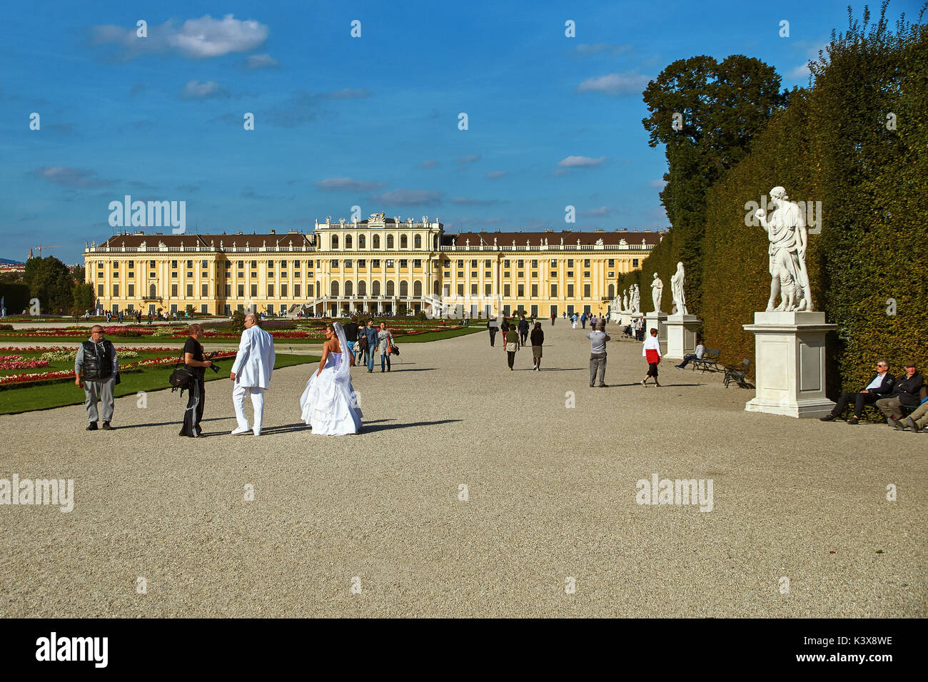 Vienna, Austria - September 24, 2014: Wedding photo shoot of bride and groom near Schonbrunn palace Stock Photo
