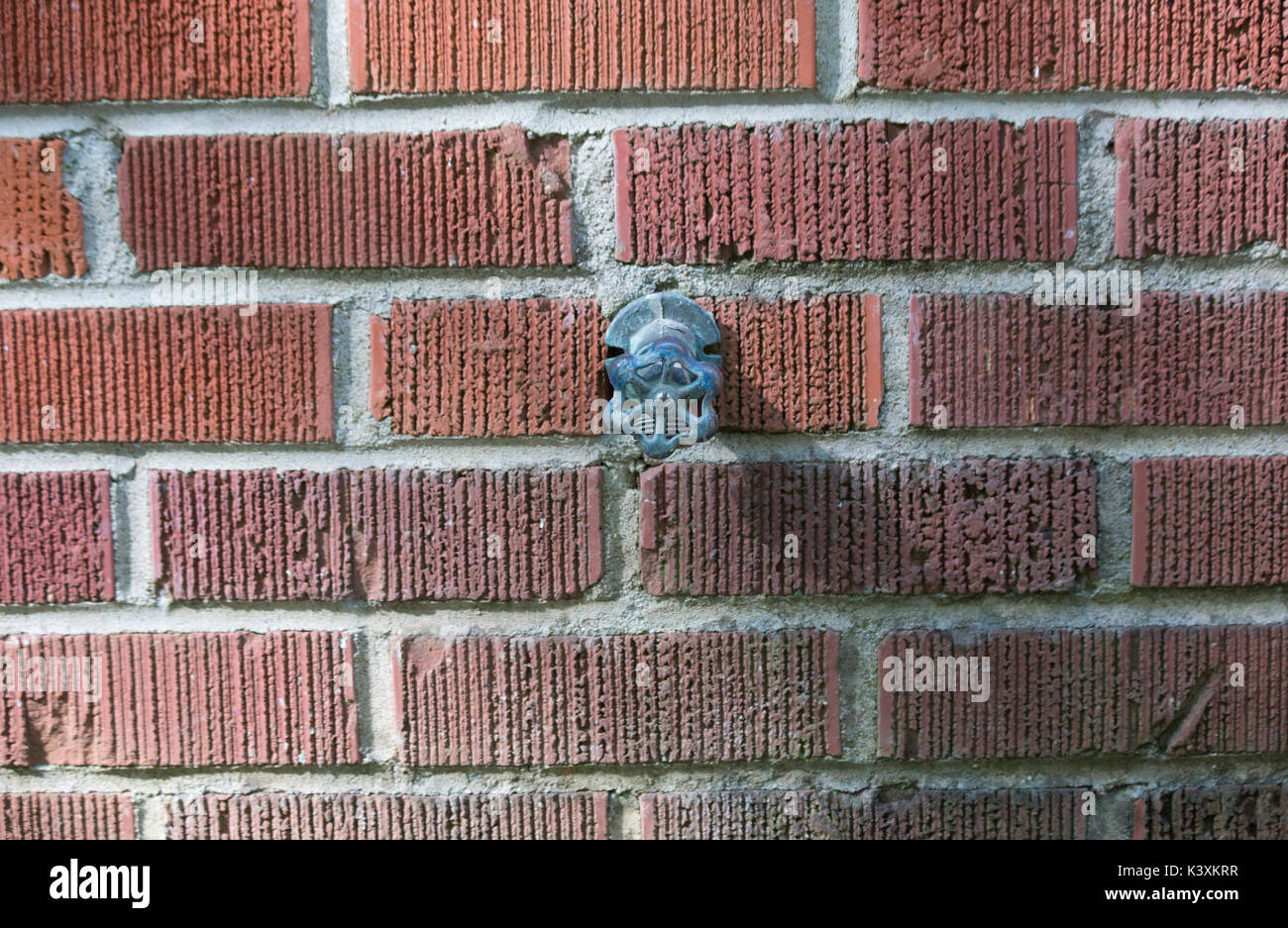 Retro water spigot on a red brick wall Stock Photo Alamy