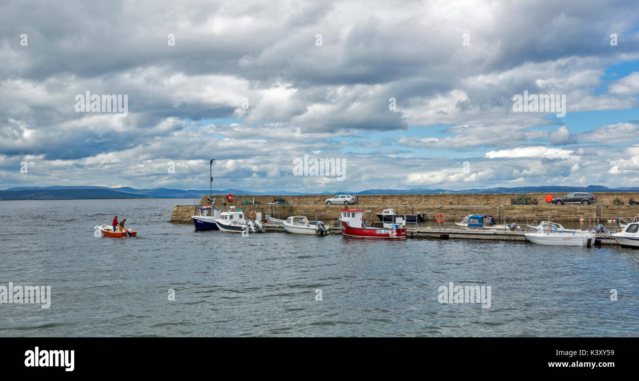 PORTMAHOMACK VILLAGE EASTER ROSS TARBAT PENINSULA  HARBOUR AND JETTY WITH MOORED FISHING BOATS Stock Photo