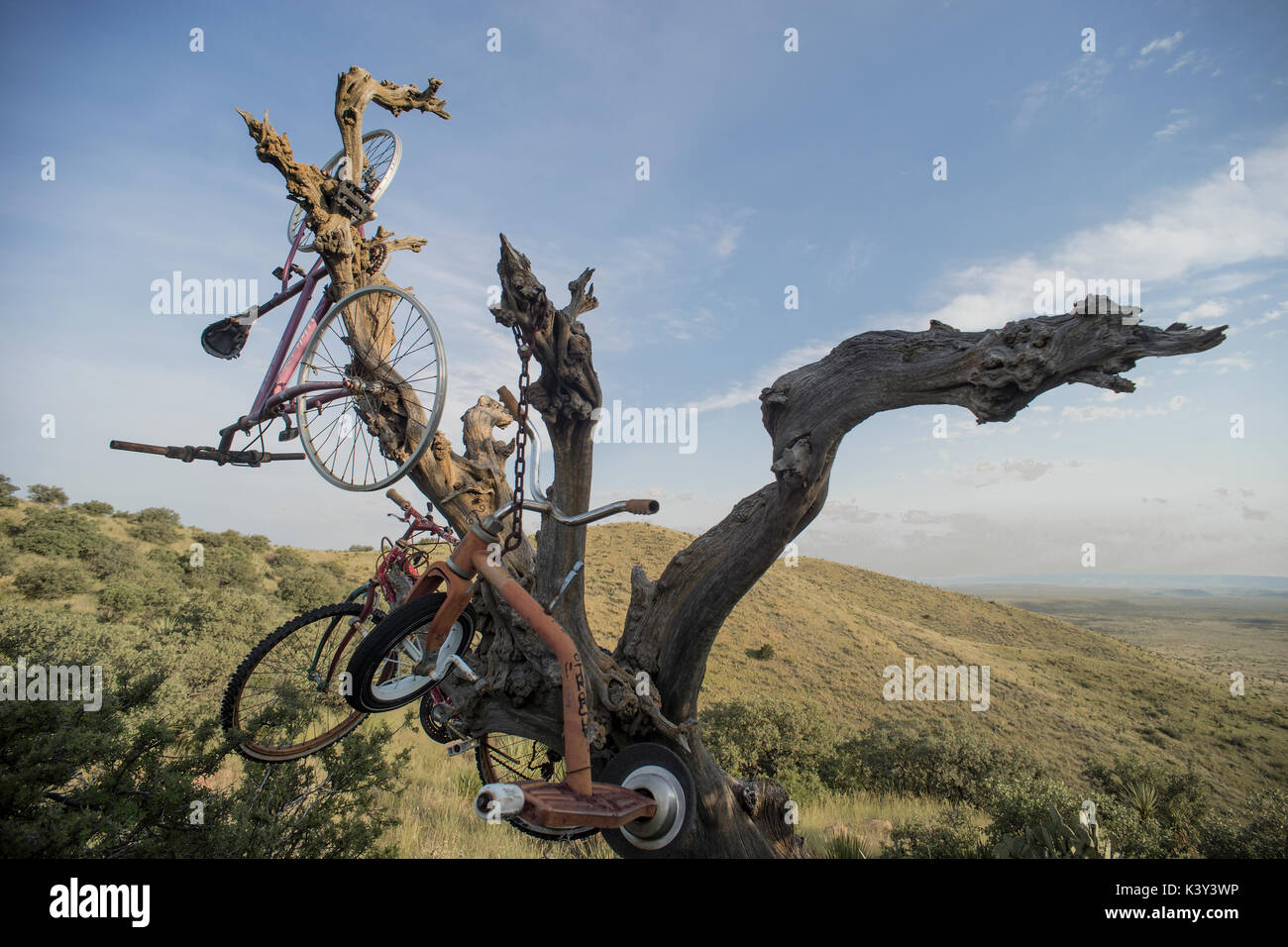 Bicycles brought atop of Hancock Hill in Alpine, Texas, as a prank by students of Sul Ross University. Stock Photo