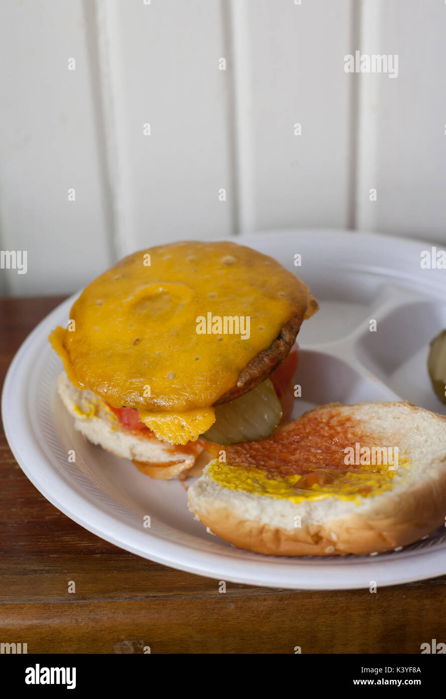 Veggie cheeseburger with pickles and ketchup Stock Photo Alamy