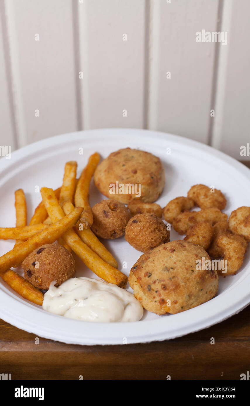 Seafood platter including popcorn shrimp, biscuits, hush puppies and