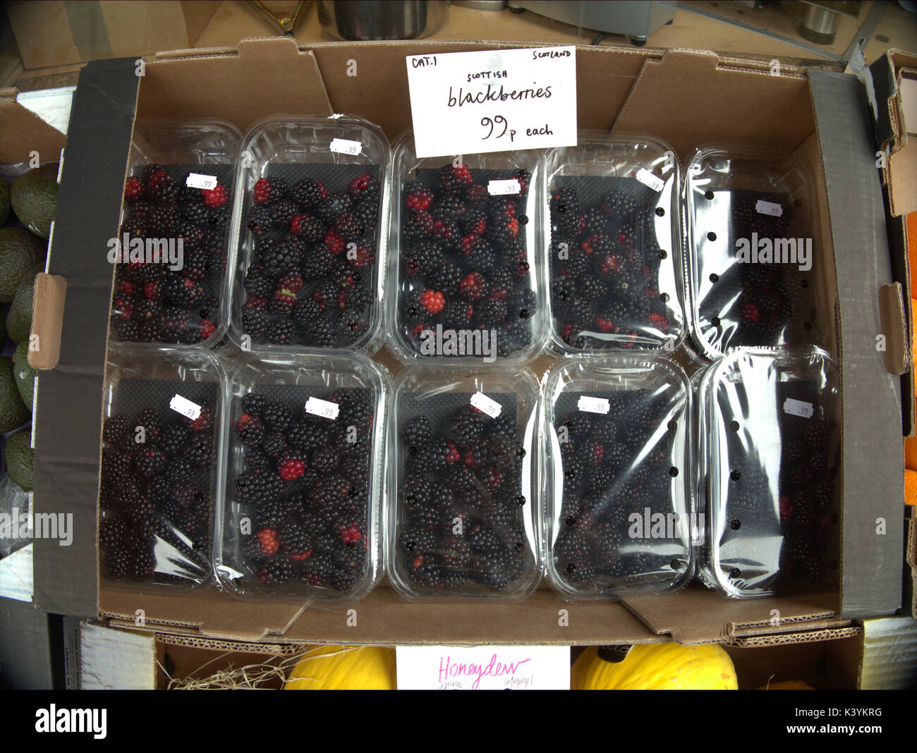 Scottish blackberries cellophane combiners market stall 99p each Stock Photo