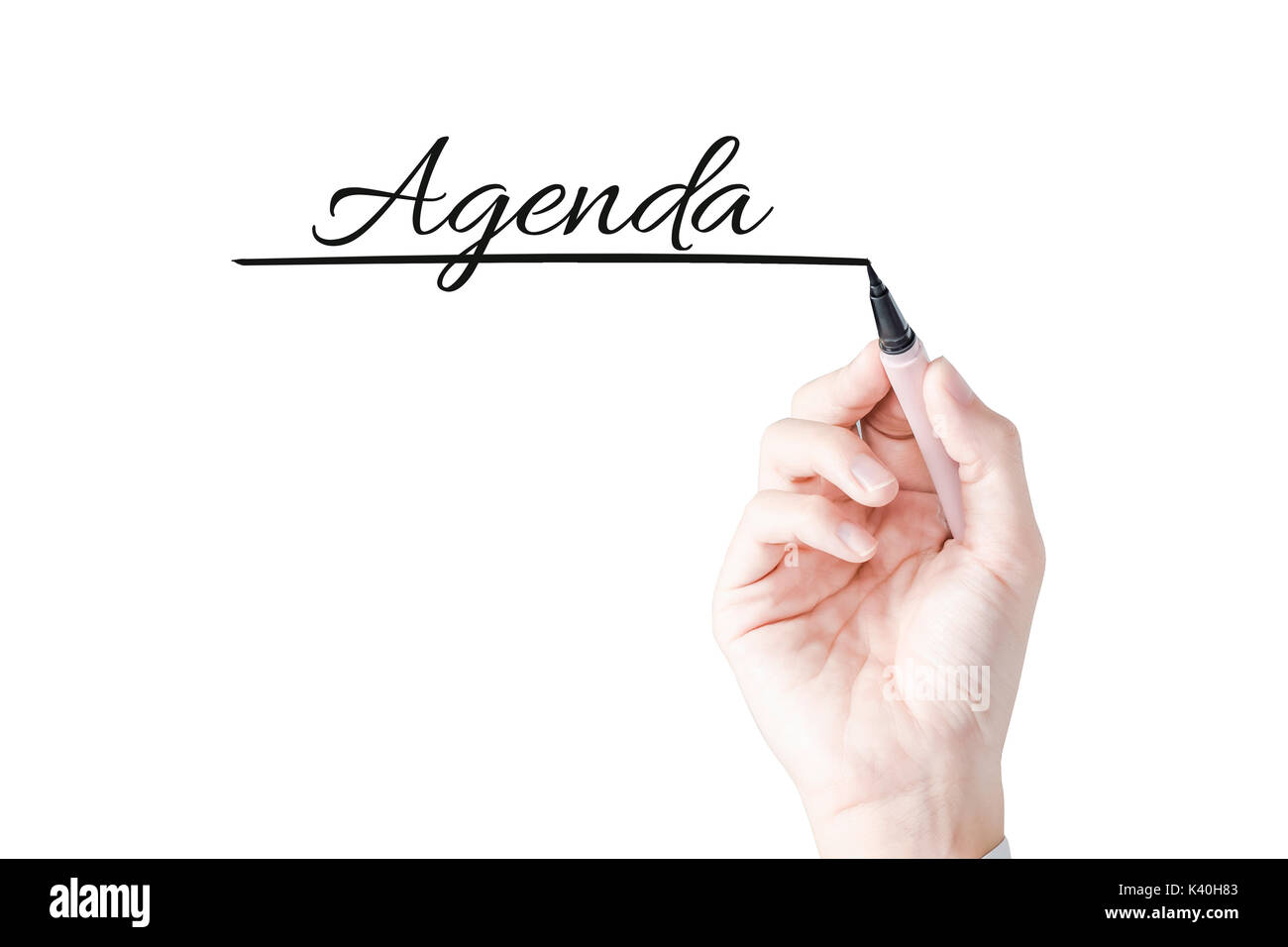 Hand writing Agenda with blue marker on transparent board Stock Photo